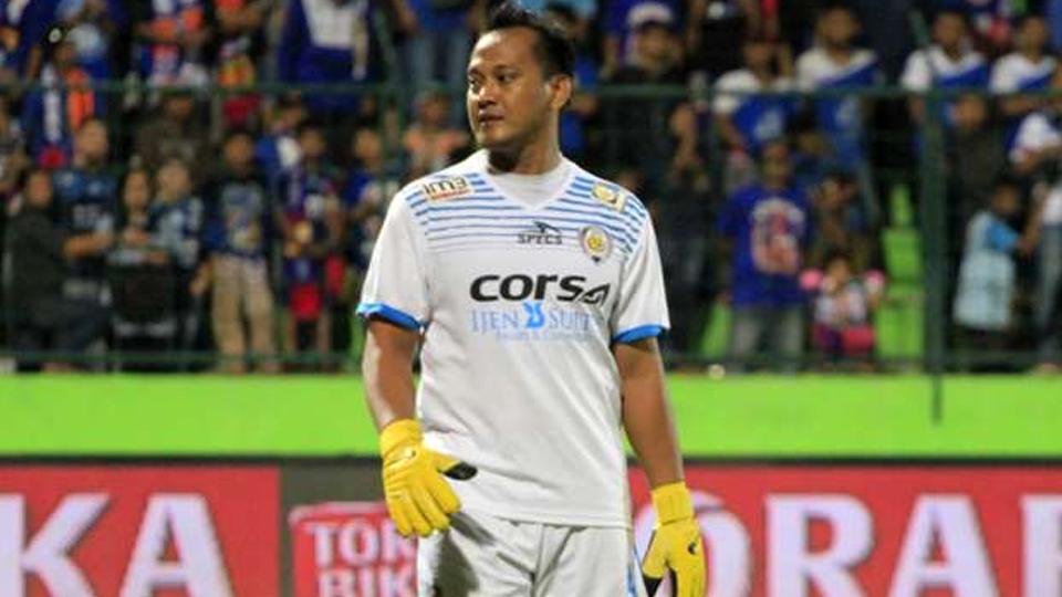 Achmad Kurniawan, kiper Arema FC yang tengah terbaring koma akibat serangan jantung. - INDOSPORT